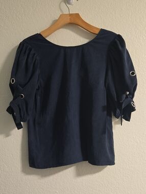 J.O.A. Navy Blue Puff Sleeve Blouse with Grommet Tie Details